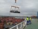 mit dieser Schaukel werden die (Ur)altwagen nach Dakar verladen. Auf dem Deck im 	Hintergrund ein VW-Bulli des Malerbetriebs B. aus Westerkappeln, Kreis Tecklenburg